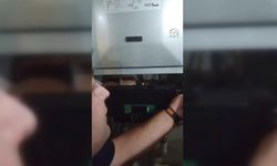 Doğal gaz kombisine sıkışan kedi kurtarıldı