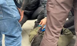 Gözaltına alınan göstericinin çantasından makas çıktı