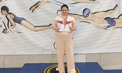 Lösemiyi yenen down sendromlu Masal, serbest yüzmede birinci oldu