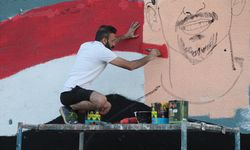 Iraklı grafiti sanatçısı 40 yıl sonra gelen Dünya Kupası sevincini Bağdat'ın duvarlarına taşıdı