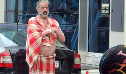 Depreme en olmayacak yerde yakalandı! Peştamalıyla kendini sokağa attı...