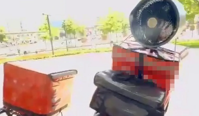 Kuryenin sıcak havaya bulduğu çözüm beğeni topladı